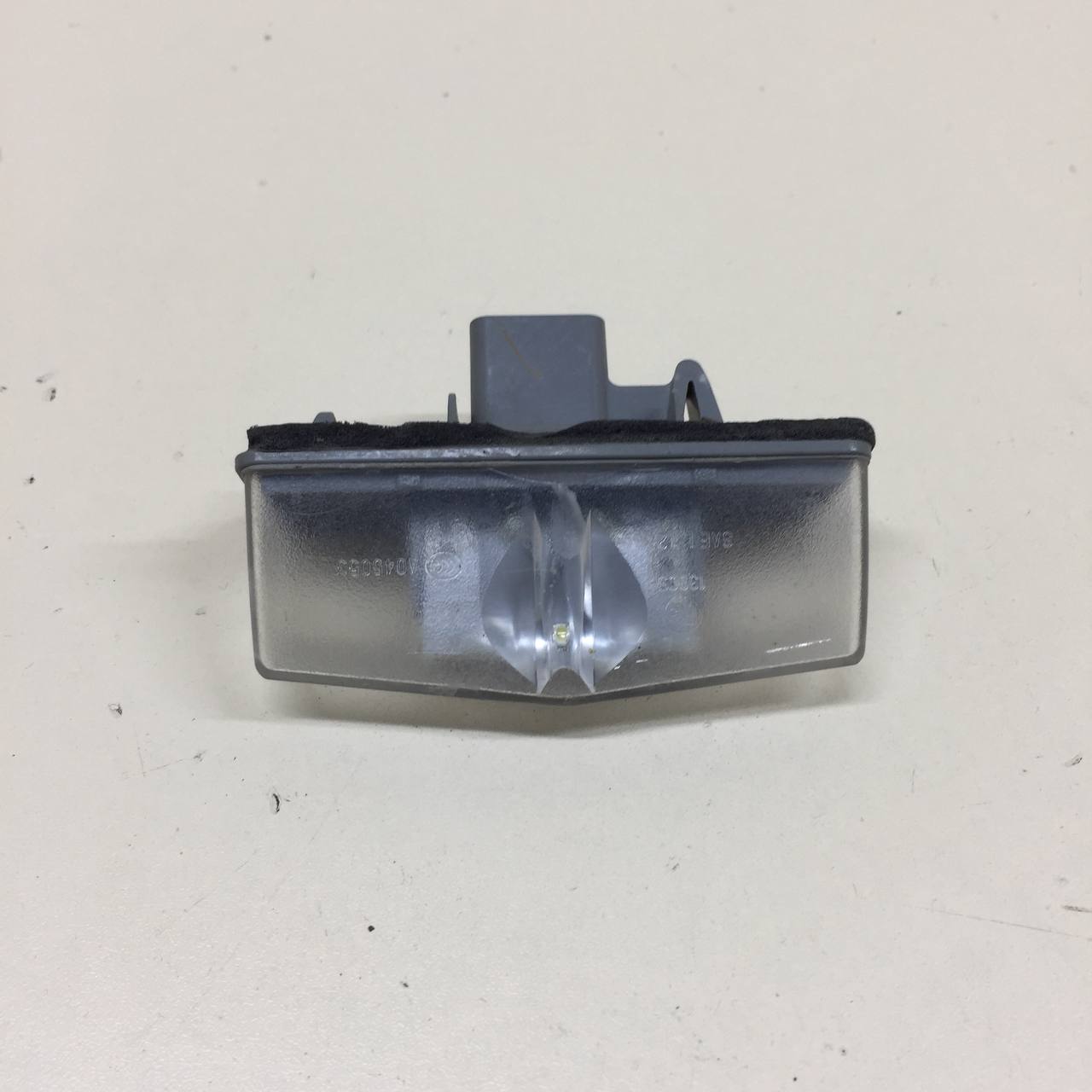 Фонарь подсветки номера Lexus NX 200 (Z10) 2014-2021 Фонарь подсветки номера Lexus NX 200 (Z10) 2014-2021