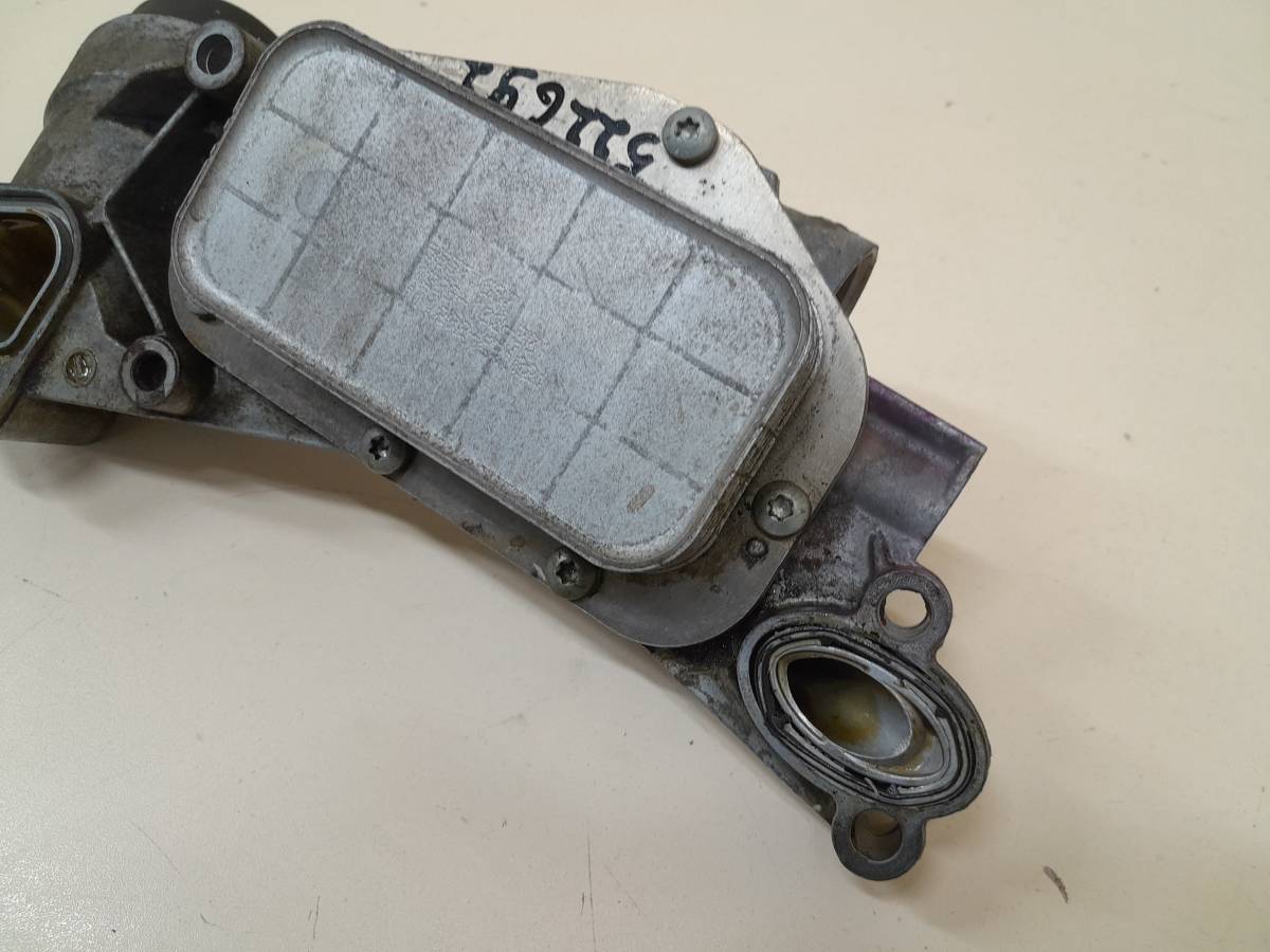 Корпус масляного фильтра Chevrolet Aveo T300 2011>