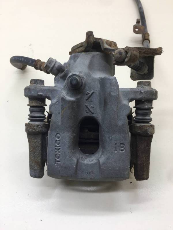 Суппорт задний левый Toyota Auris (E150) 2006-2012