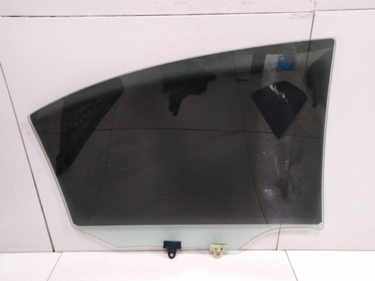 Стекло двери задней левой Nissan Primera (P12) 2002-2007