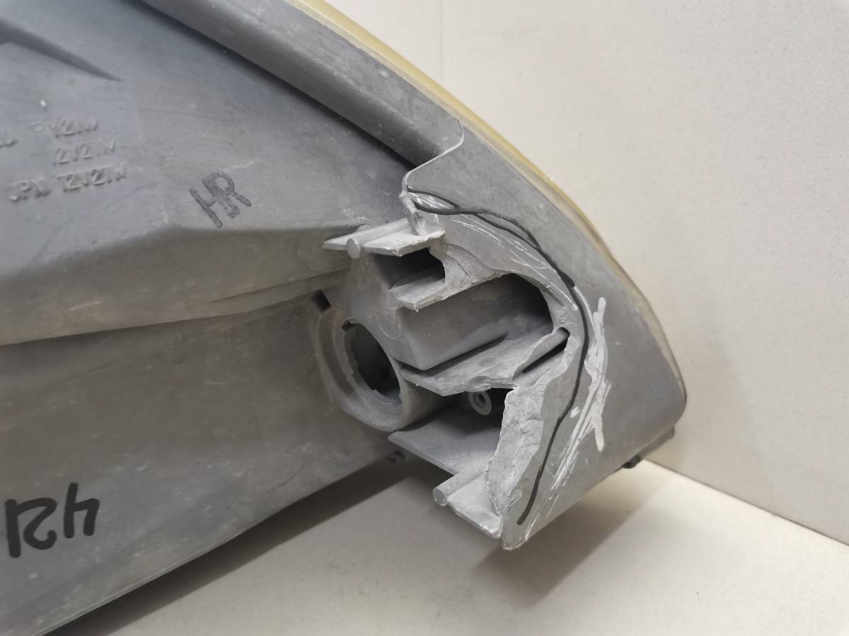 Фара левая Toyota Passo (XC10) 2004-2010