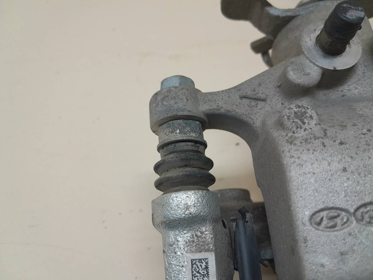 Суппорт задний левый Kia K5 (DL3) 2019>