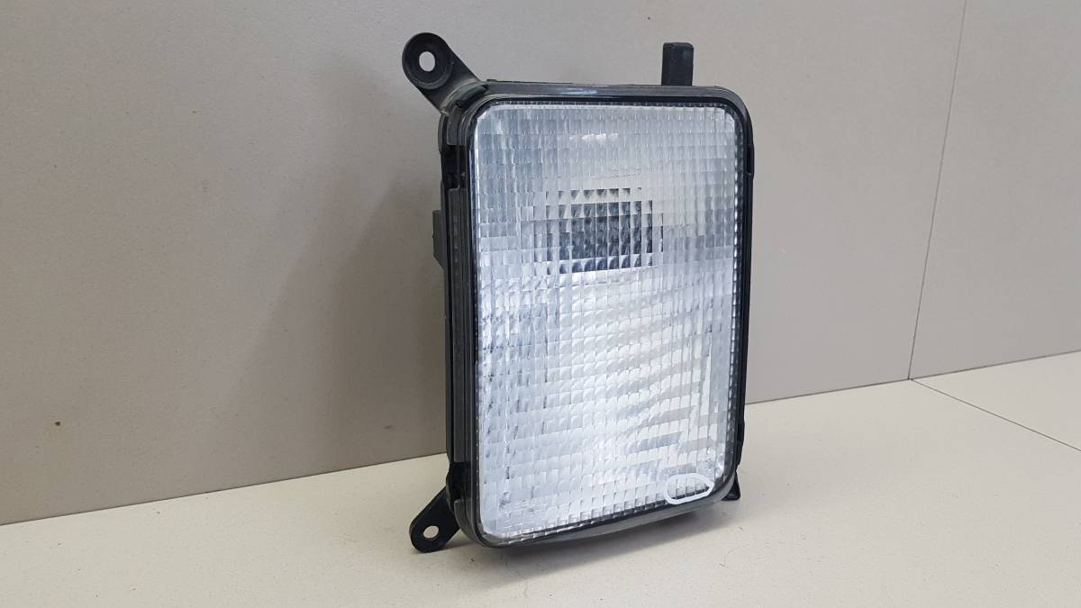 Указатель поворота левый Nissan Cube (Z11) 2002-2008