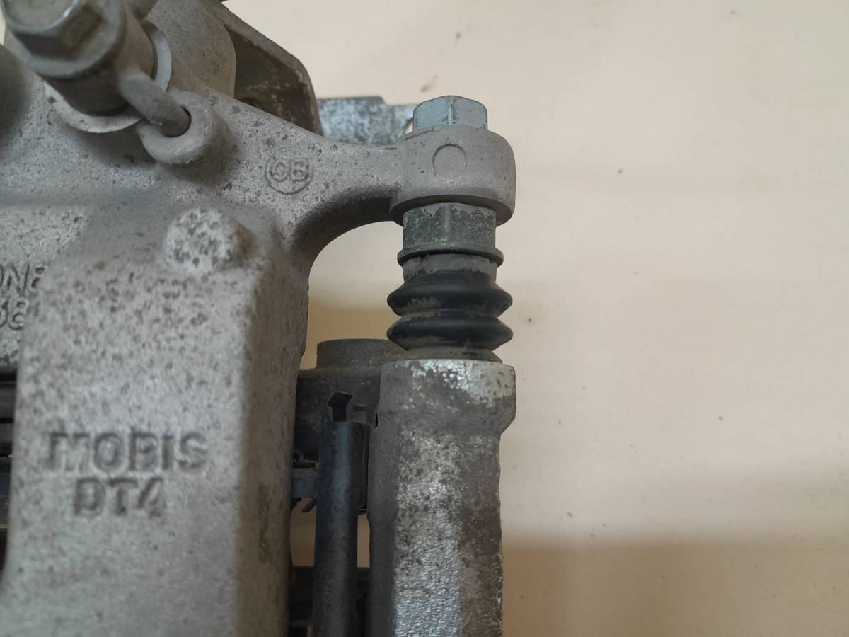 Суппорт задний левый Kia K5 (DL3) 2019>