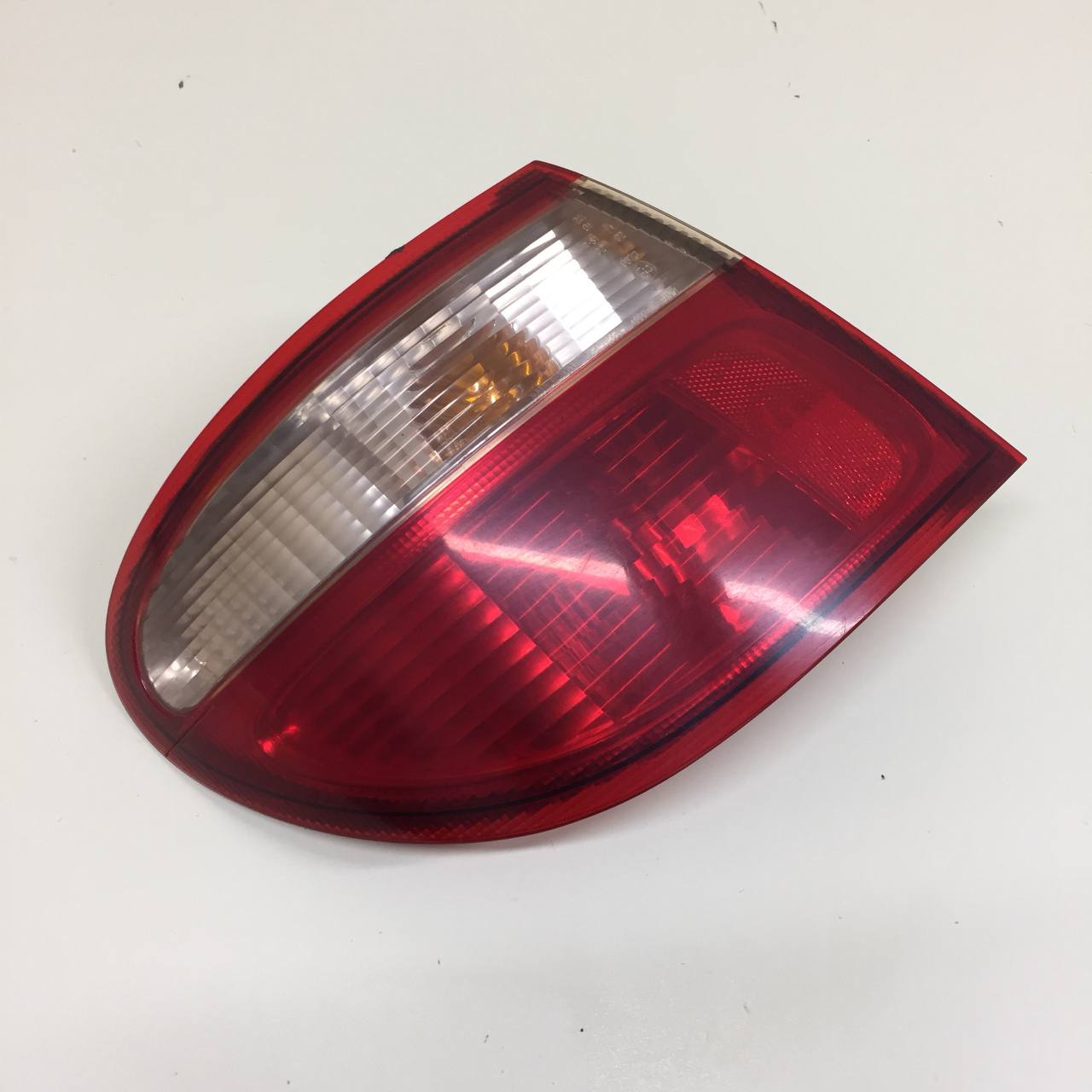 Фонарь задний наружный левый Nissan Almera (N16) 2000-2006 Фонарь задний наружный левый Nissan Almera (N16) 2000-2006