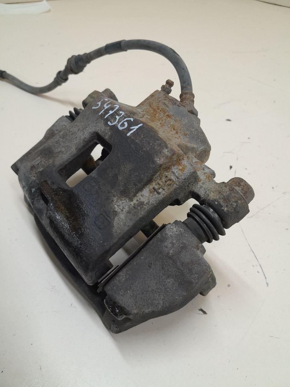 Суппорт передний правый Kia Sephia 2001-2004