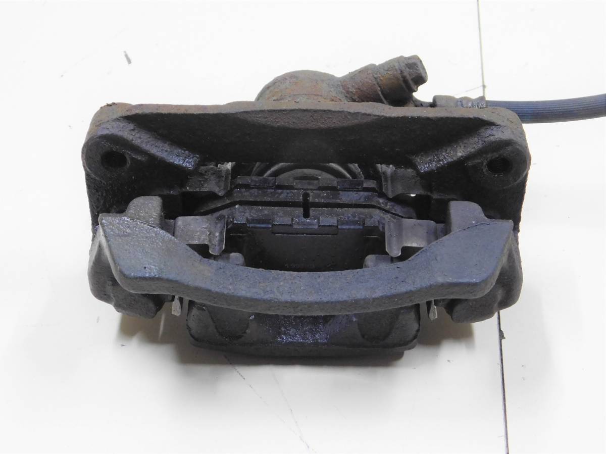 Суппорт задний левый Subaru Impreza (G12) 2007-2012
