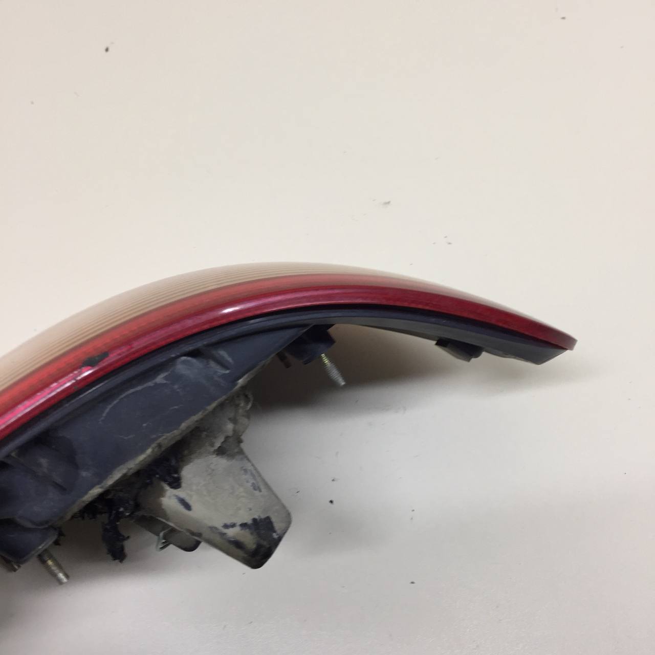 Фонарь задний наружный левый Nissan Almera (N16) 2000-2006 Фонарь задний наружный левый Nissan Almera (N16) 2000-2006