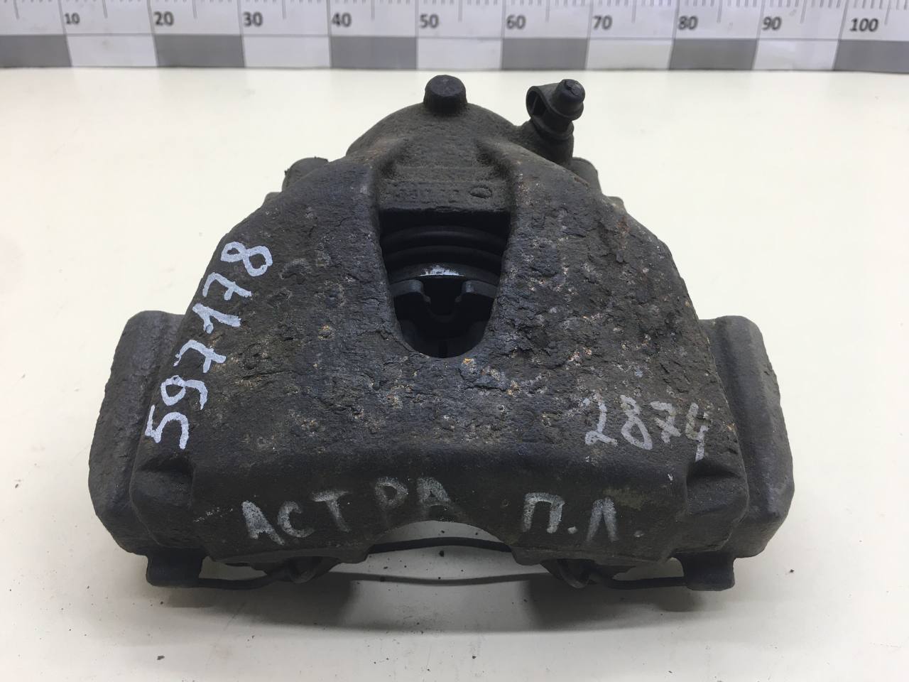 Суппорт передний левый Opel Astra H / Family 2004-2015