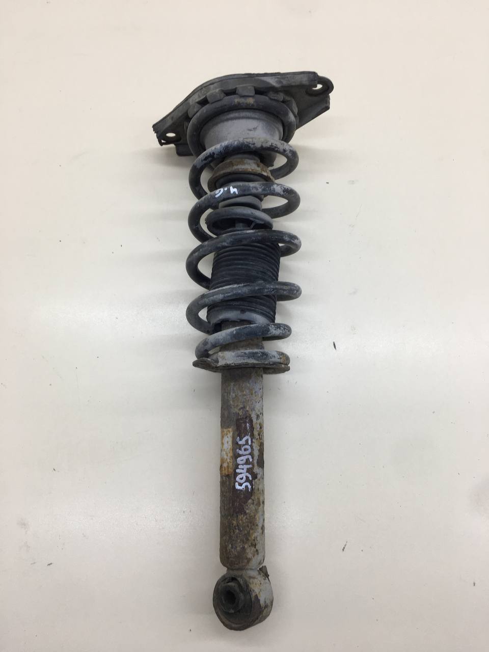 Амортизатор задний Nissan Primera (P12) 2002-2007