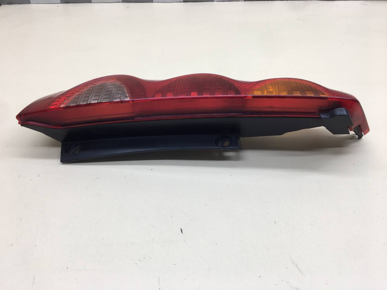 Фонарь задний левый Nissan Note (E11) 2006-2013