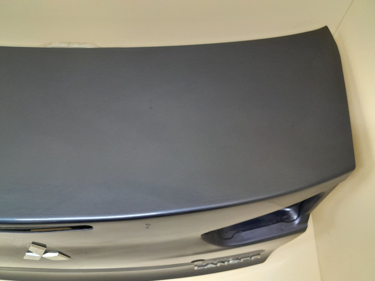 Крышка багажника Mitsubishi Lancer X (CX, CY) 2007> Крышка багажника Mitsubishi Lancer X (CX, CY) 2007>