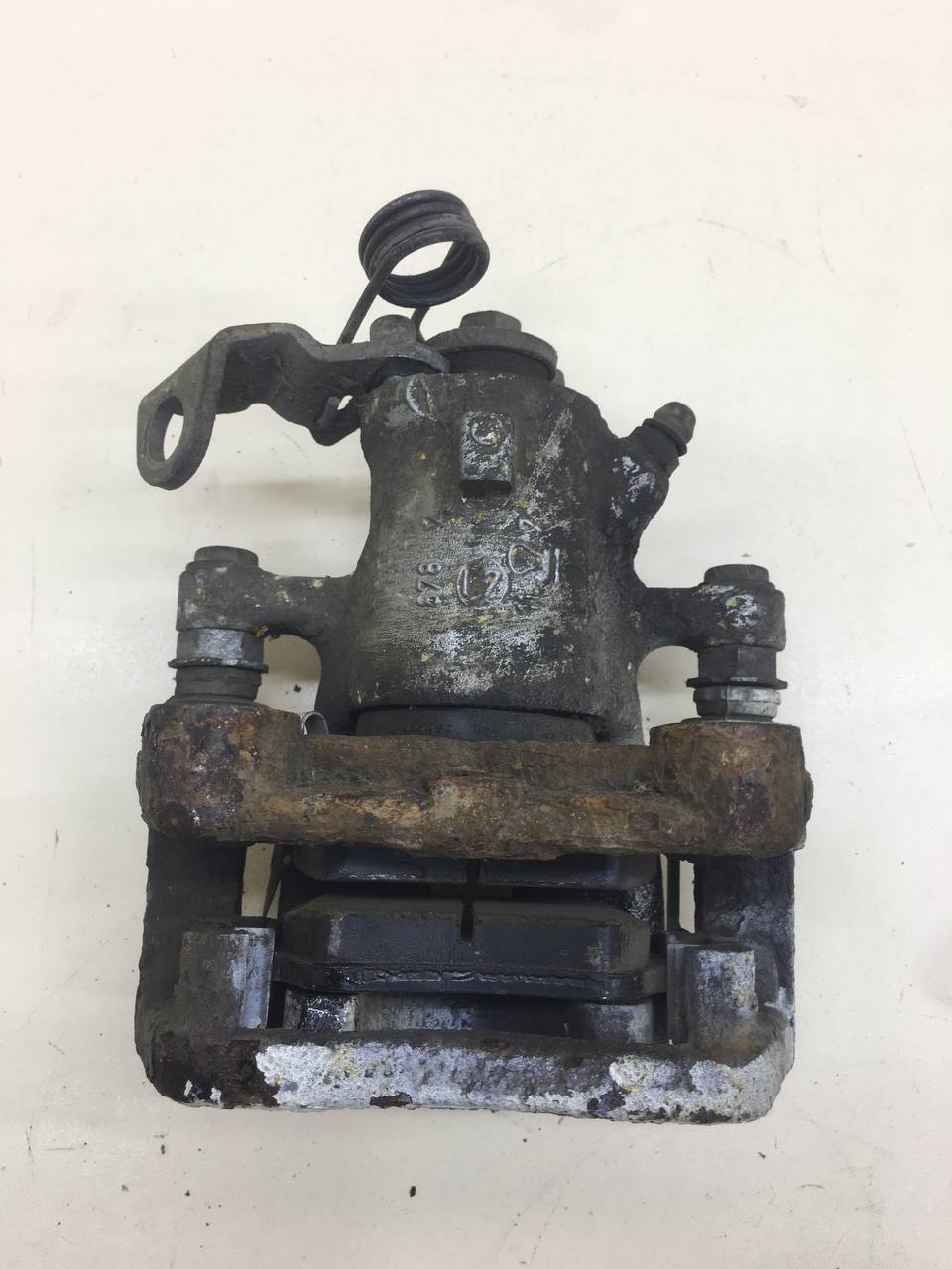 Суппорт задний левый Opel Astra H / Family 2004-2015