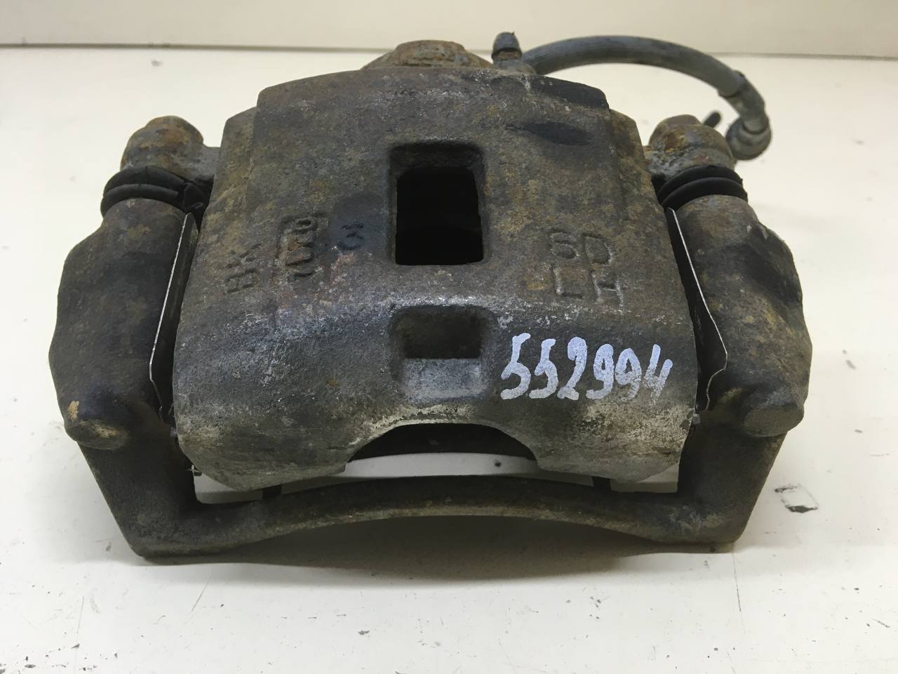 Суппорт передний левый Kia Spectra (SD) 2004-2011